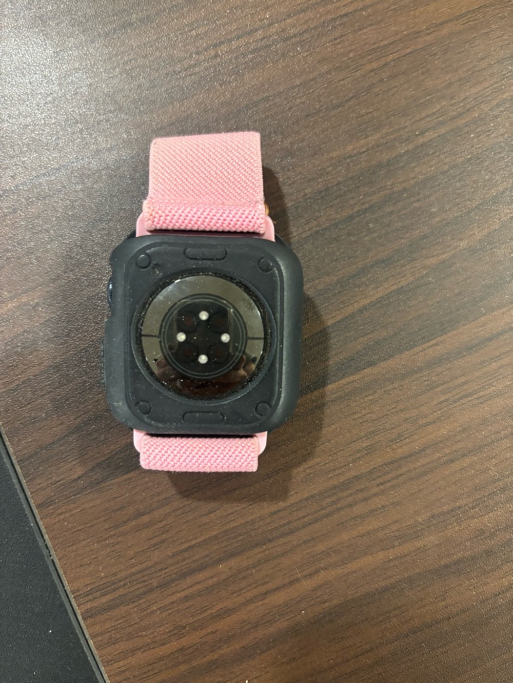 Apple Watch with Pink Sport Loop and Black and Pink Silicone Case - Picture 2 of 2